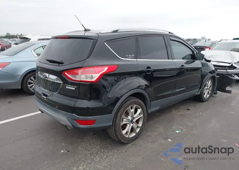 2016 Ford Escape Titanium z USA, uszkodzony, nr VIN 1FMCU0JX6GUB79270
